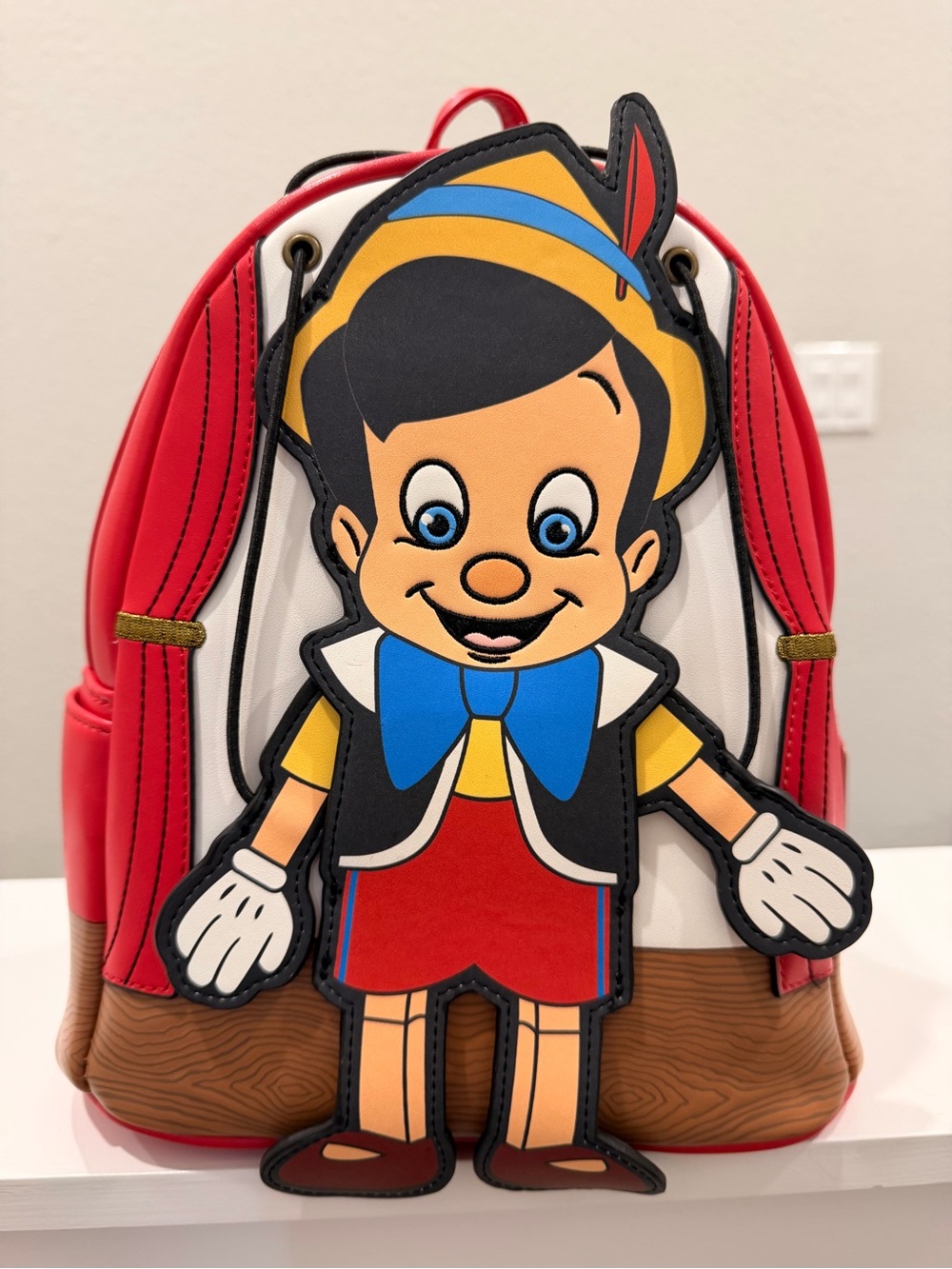 LOUNGEFLY NWT
Pinocchio Character Mini Backpack